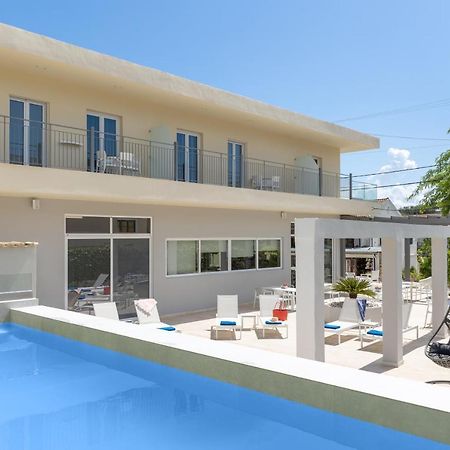 Melina Oasis Boutique Hotel Kassiopi Buitenkant foto